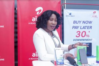 Ms. Carol Asio, Head of Retail at Airtel Uganda addressing the media at the Airtel Uganda and EASYBUY partnership launch at the Kingdom Kampala Airtel Shop.