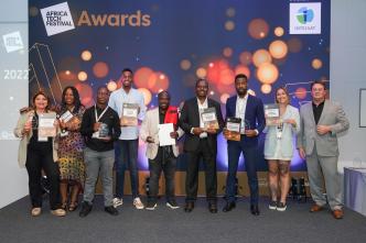 Winners of the 2022 Africa Tech Festival Awards pose for a group photo with their accolades. COURTESY PHOTO / Africa Tech Festival Awards