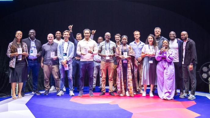 Startup founders pose for a group photo with their accolades after emerging as winners from their respective categories at the AfricArena Grand Summit in Cape Town, South Africa. Courtesy Photo