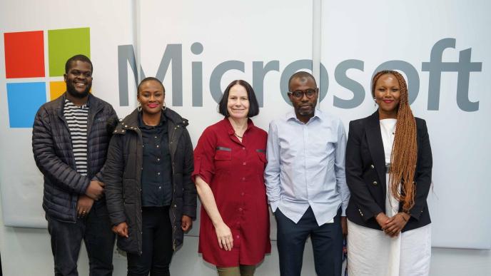 Collaborators of the "AI and the Future of Work in Africa Whitepaper" (L-R): Vukosi Marivate, Dr. Onyi Nwaneri, Jacki O’Neill, Najeeb Abdulhamid, and Winnie Karanu, Microsoft Africa pose for a group photo at an AI Summit hosted at Microsoft South Africa’s offices. COURTESY PHOTO