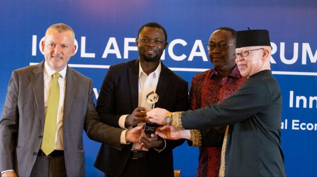 Damien O'Sullivan (left), CEO ICDL Foundation receives the ICDL Africa Digital Excellence Award on behalf of Dr. Aminah Zawedde, Permanent Secretary of the Ministry of ICT and National Guidance to Uganda. Courtesy Photo