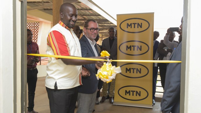 MTN Uganda Head of Commercial Andrew Tusubira and Enabel's Digital for Developemt Expert Bart Cornille launches the ICT Lab at UTC, Kyema in Masindi District.