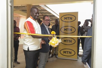 MTN Uganda Head of Commercial Andrew Tusubira and Enabel's Digital for Developemt Expert Bart Cornille launches the ICT Lab at UTC, Kyema in Masindi District.