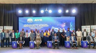 (Front row: L-R): Eng. Christine Mugimba, Dr. Aminah Zawedde, Hon. Dr. Chris Baryomunsi, Dean Munene, and Dr. Fredrick Kitoogo and other officials and attendees pose for a group photo after the launch of the AVR Cluster Center at UICT. Courtesy Photo/UICT