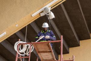 Blue Crane communications engineers at work during the recent Namboole Stadium renovation. PHOTO: BCC