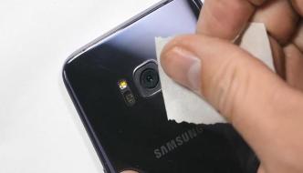 Cleaning a camera of a Samsung smartphone to get better and clear photos and videos. COURTESY PHOTO