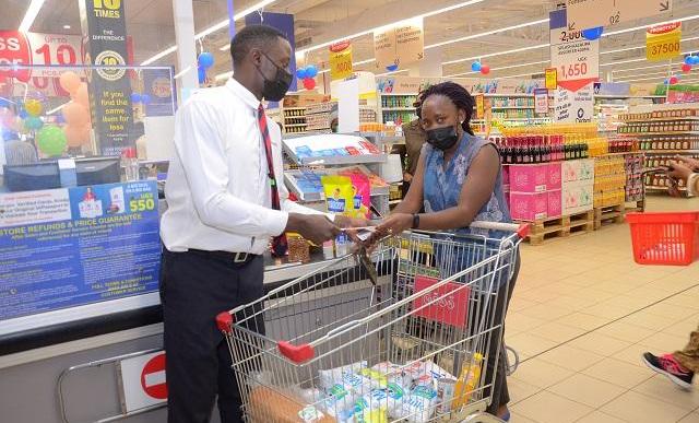 A customer pictured after paying for her groceries at Carrefour. (COURTESY PHOTO / FILE PHOTO)