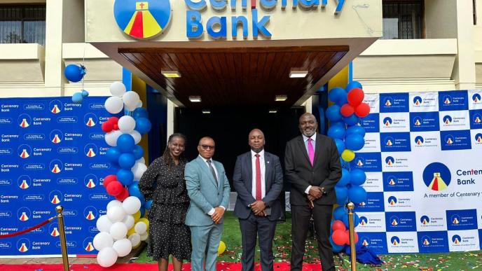 The Centenary Group team pose for a picture outside the newly unveiled bank in Lilongwe, capital of Malawi.