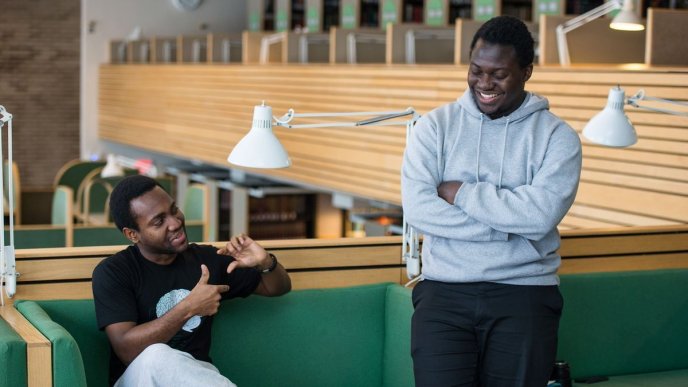 Chipper Cash Founders; Ugandan Ham Serunjogi (R) and Ghanaian Majid Moujaled (L) sharing a light moment together. (PHOTO: Chipper Cash)