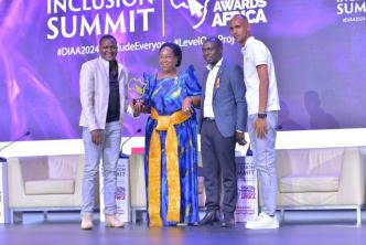 ClinicPesa, a platform making waves in healthcare financing collect their award after winning the Fintech of the Year category in the 2024 Digital Impact Awards Africa. The award was presented to them by Hon. Joyce Nabbosa Ssebugwawo (2nd from left), Minister of State for ICT. PHOTO: HiPipo