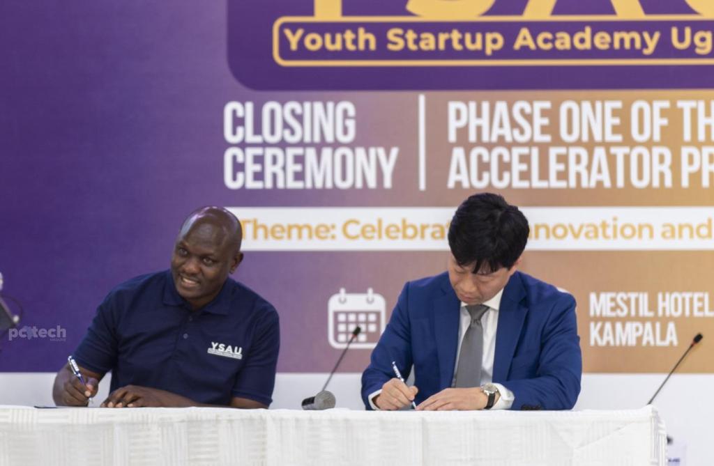 Mr. Isaac Kiwanda (left) and Mr. Park (right) signing the Memorandum of Understanding (MoU) for direct investment. PHOTO: PC Tech Magazine