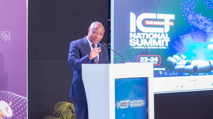 Hon. Godfrey Kabbyanga Baluk; Minister of State for National Guidance giving keynote speech at the inaugural ICT National Summit before officially opening it. Courtesy Photo