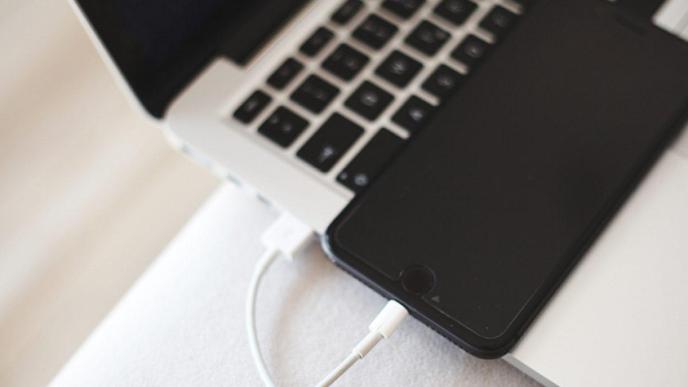 Pictured a phone tethered internet to a laptop via a USB cable. COURTESY PHOTO