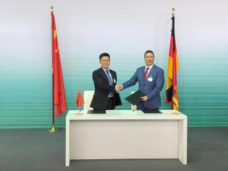 Chinese Premier; Li Keqiang and German Chancellor; Angela Merkel shake hands after signing the Memorandum of Understanding (MoU) for the development of intelligent connected vehicles.