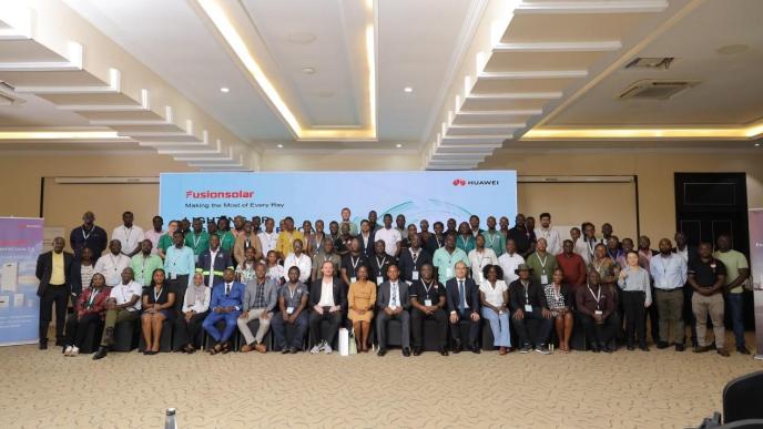 Huawei Digital Power channel partners pose for a group photo at the end of the FusionSolar Partner Summit which was held in Kampala, Uganda to release the latest sustainable energy solutions into the Ugandan industry.