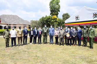 President Yoweri Kaguta Museveni (in a white mask) with a delegation from Huawei Technologies Uganda, and Ministers pose for a group photo after a meeting to establish a Digital Village Prototype in Uganda. Meeting was held at the National Leadership Institute NALI Kyankwanzi on Tuesday, July 9th, 2024. PHOTO: State House Uganda / PPU