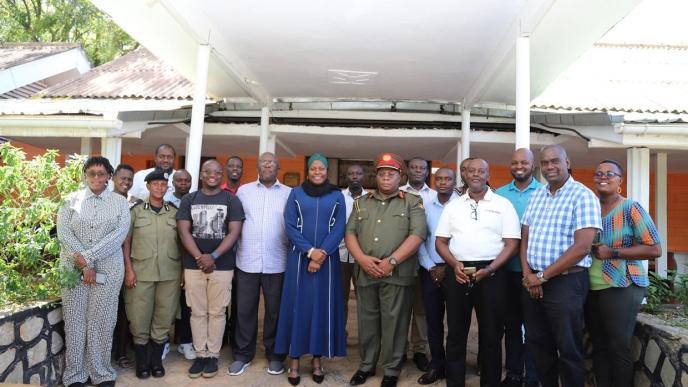 Dr. Aminah Zawedde (5th from left), the Permanent Secretary of the Ministry of ICT and National Guidance, and Col. Emmy Katabazi (6th from left), the Deputy Director General of the Internal Security Organization pose for a group photo with other government officials. COURTESY PHOTO