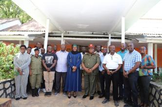 Dr. Aminah Zawedde (5th from left), the Permanent Secretary of the Ministry of ICT and National Guidance, and Col. Emmy Katabazi (6th from left), the Deputy Director General of the Internal Security Organization pose for a group photo with other government officials. COURTESY PHOTO