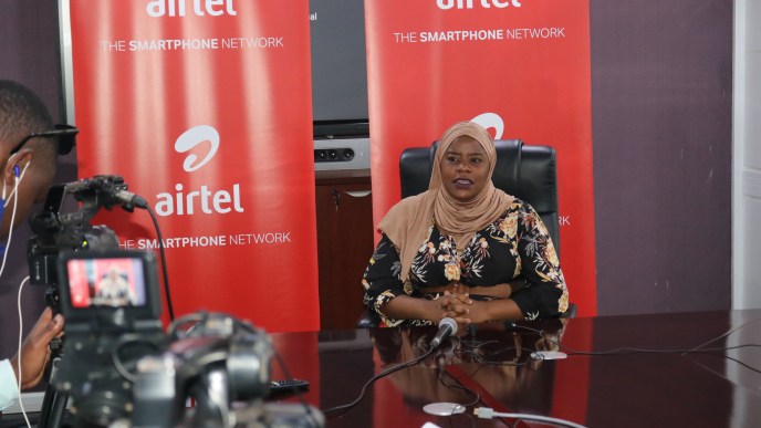 Joweria Nabakka, Head of Data At Airtel Uganda briefs the press at the launch of the Tecno Phantom X2 series smartphones.