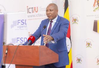 Minister of State for National Guidance; Hon. Kabbyanga Godfrey Baluku addressing the press at the launch of the Inaugural ICT National Summit. PHOTO: PC Tech Magazine