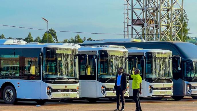 Innocent Orikiiriza (in green t-shirt); Founder and CEO of KaCyber Technologies with a colleague at Kiira Motors Corporation Vehicle Plant in Jinja. PHOTO: Innocent Orikiiriza