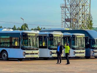 Innocent Orikiiriza (in green t-shirt); Founder and CEO of KaCyber Technologies with a colleague at Kiira Motors Corporation Vehicle Plant in Jinja. PHOTO: Innocent Orikiiriza