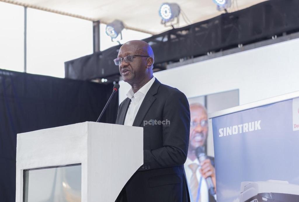 Kajuna Benon, the Director of Transport Ministry of Works and Transport speaking at the launch of new Sino truck models in Uganda at Double Q head offices in Busega. PHOTO: PC Tech Magazine