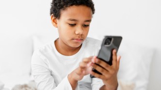 Children are increasingly spending time on apps that often encourage in-app purchases, especially during school holidays. PHOTO: Freepik