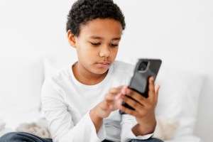 Children are increasingly spending time on apps that often encourage in-app purchases, especially during school holidays. PHOTO: Freepik