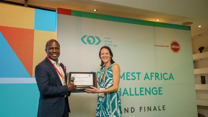 Lauren Anderson, Co-founder and CEO of Koa Academy receives a certificate of recognition after their startup wins the 2023 MEST Africa Challenge in Accra, Ghana. COURTESY PHOTO / MEST Africa via X (twitter)