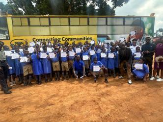 Pupils from the Uganda School for the Deaf happily pose with their certificates after completing a weeks training in ICT courtesy of MTN Uganda to thrive in a digital era.