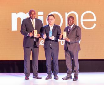 (In pictorial L-R): Minister of ICT and National Guidance; Hon. Chris Baryomunsi, Ben Yu; Mione Brand Representative in Uganda, and State Minister for Trade; Industry and Cooperatives; Hon. David Bahati display the Mione U1 and Mione Joy 9 at their launch event at Four Points by Sheraton in Kampala.