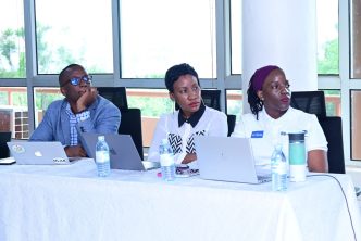 The 2023 MTN Uganda MoMo hackathon Judges (L-R); Dr. Raymond Mugwanya, Jamillah Mayombwe, and Viola Namuyaba.