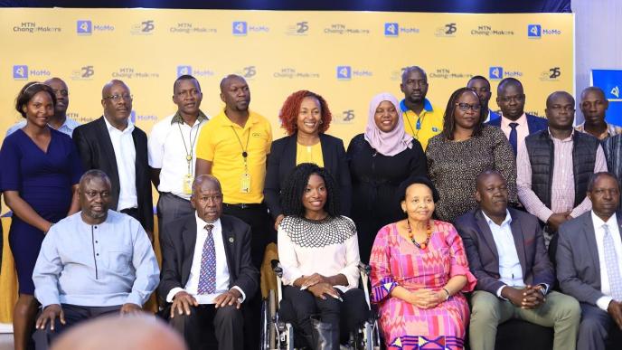 MTN Foundation's social initiative dubbed MTN Changemakers seeks to transform the lives of communities across Uganda. Pictured MTN Uganda CEO Sylvia Mulinge (5th from left in back row) with other officials and partners of the initiative.