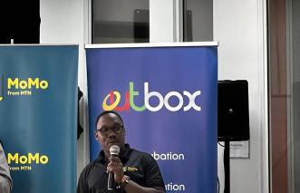 Gerald Musoke, MTN Mobile Money Products Development Specialist, speaking at the launch of the third MTN MoMo API Hackathon. COURTESY PHOTO/MTN