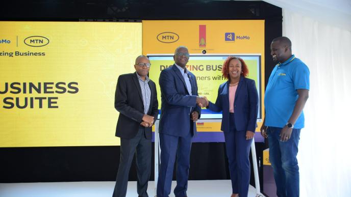 UBL Managing Director, Andrew Kilonzo and MTN CEO Sylvia Mulinge unveils FMCG Digital Suite in Kampala on Jukly 14. Looking on UBL Commercial Director, Ben Mbuvi (L) and MTN MoMo MD Richard Yego.