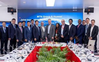 MTN Group and Huawei Technologies officials pose for a group photo at signing an MoU for a Joint Innovation Technology Lab which will be built at MTN Group's headquarters in South Africa.