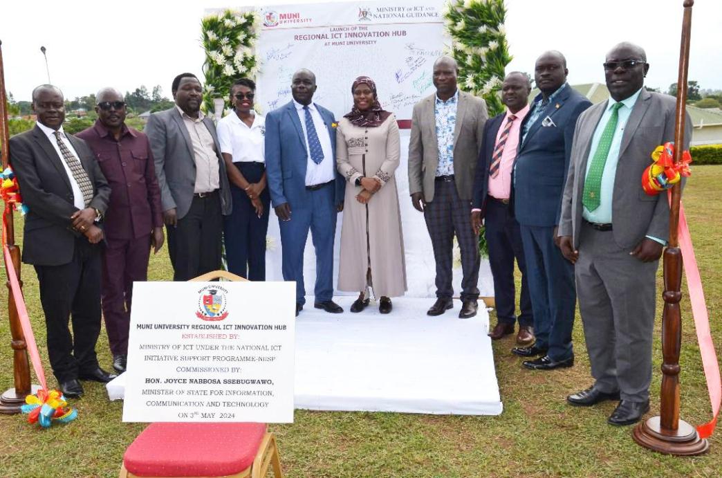 Permanent Secretary of the Ministry of ICT and National Guidance, Dr. Aminah Zawedde (5th from right) with other guests including Hon. Feta Geofrey, Hon. Leku Joel, Hon. Ezama Siraji Brahan, and Hon. Noah Musa pose for a group photo after officially opening the West Nile regional ICT Innovation Hub at Muni University in Arua City. COURTESY PHOTO