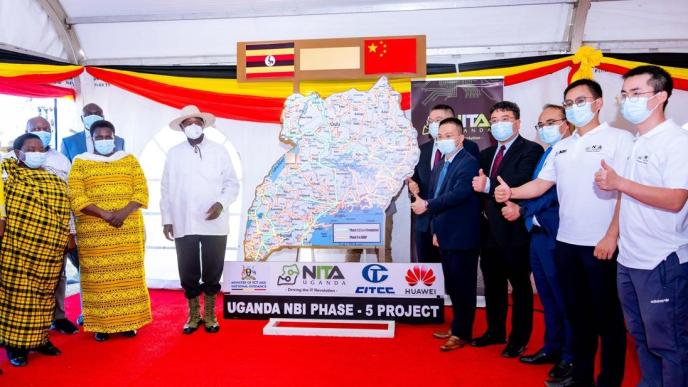 President Yoweri Kaguta Museveni (in hat) with the Vice President; Jesicca Alupo (2nd from left), Prime Minister; Robinah Nabbanja (extreme left), representatives from the Government of China, and other officials from NITA Uganda pose for a group photo after launching Phase 5 of the NBI Project. PHOTO: PPU