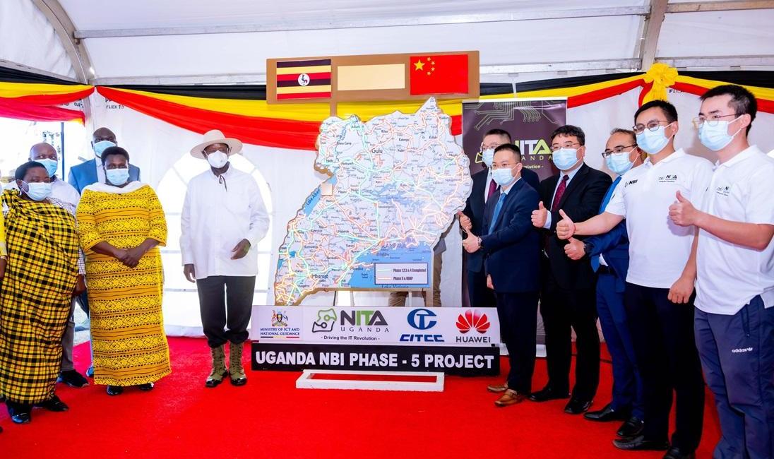 President Yoweri Kaguta Museveni (in hat) with the Vice President; Jesicca Alupo (2nd from left), Prime Minister; Robinah Nabbanja (extreme left), representatives from the Government of China, and other officials from NITA Uganda pose for a group photo after launching Phase 5 of the NBI Project. PHOTO: PPU