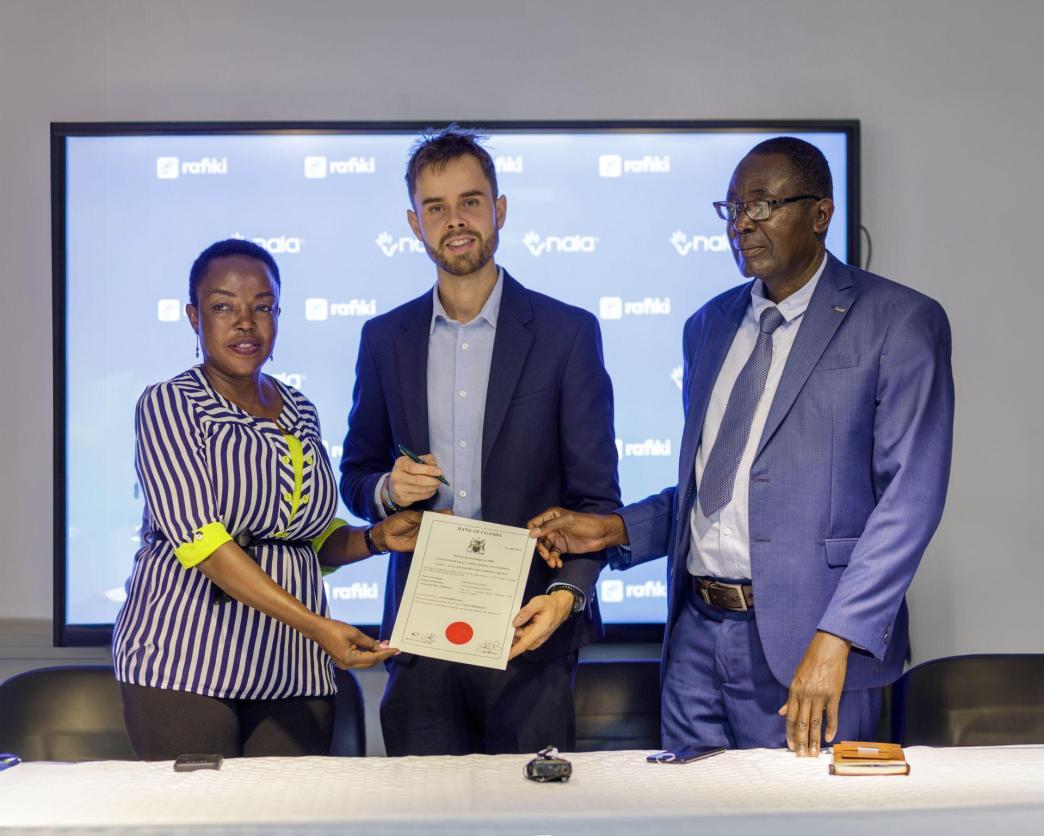 NALA COO, Nicolai Eddy (centre) receiving their International Money Transfer Operator (IMTO) licence. PHOTO: NALA/via LinkedIn