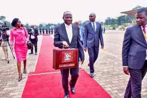 Minister of Finance, Planning, and Economic Development Hon. Matia Kasaija with the Financial Year 2024/25 budget. COURTESY PHOTO/PPU