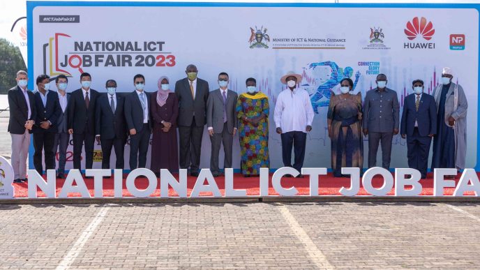 President Museveni (in white shirt) with the VP, Jessica Alupo on his right pose for a group photo with delegates from Huawei and Ministry of ICT after launching the 2nd Annual National ICT Job Fair 2023.