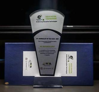 The design of an award plaque has a significant impact, influenced by factors such as material choice, engraved techniques, and customization options. [In Picutre] an e-governance execllence award by NITA-U won by PC Tech Magazine's tech reporter. PTM Photo/Olupot Nathan