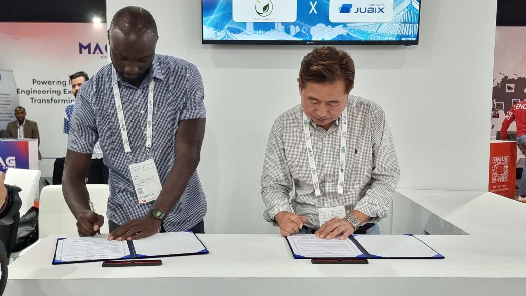 Ntakye Holdings has partnered with Jubix, another prominent South Korean company focusing on collaborative efforts in solar-integrated technology. Pictured; both party's representatives signing MoU during GITEX Africa. COURTESY PHOTO