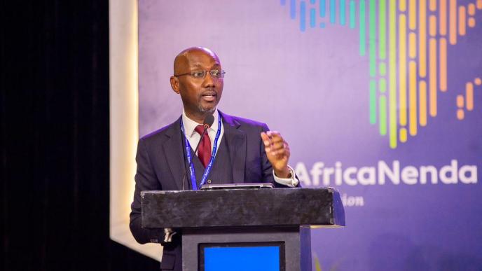 Dr. Robert Ochola, CEO of AfricaNenda speaking at the launch of the State of Inclusive Instant Payment Systems (SIIPS) 2024 Report in Accra, Ghana. PHOTO: AfricaNenda