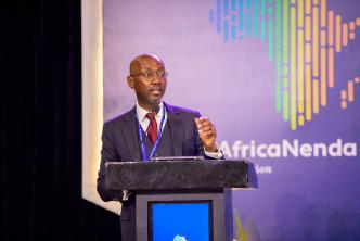 Dr. Robert Ochola, CEO of AfricaNenda speaking at the launch of the State of Inclusive Instant Payment Systems (SIIPS) 2024 Report in Accra, Ghana. PHOTO: AfricaNenda