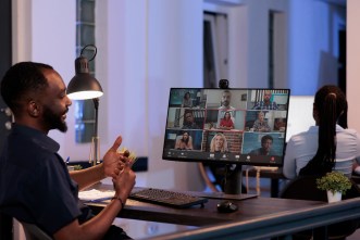 A man pictured having a videocall meeting with work colleagues. PHOTO: DCStudio / via Freepik