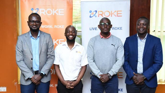 (L-R): Peter Muhumuza; Chief Technical Officer at Roke Telkom, Jesse Ntale; Brand and Marketing Manager at Roke Telkom pose for a photo with other Roke Telkom staff members after launching their Fibre to the Home (FTTH) and Fibre to the Enterprise (FTTE) services campaign.