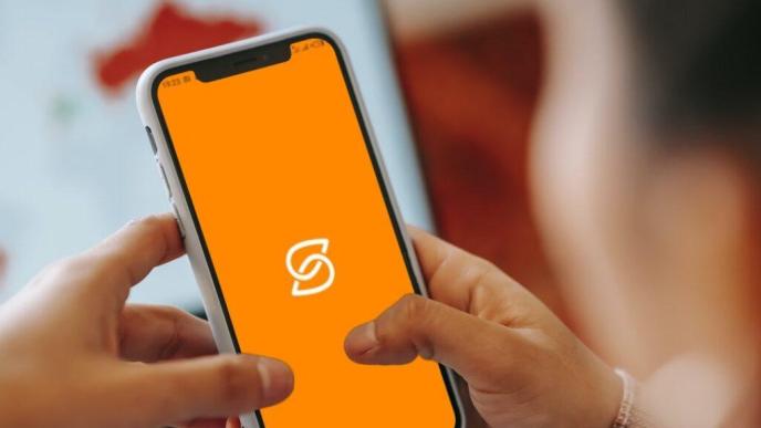 Pictured shows a silhouette of a person opening the safeboda app. FILE PHOTO/COURTESY PHOTO